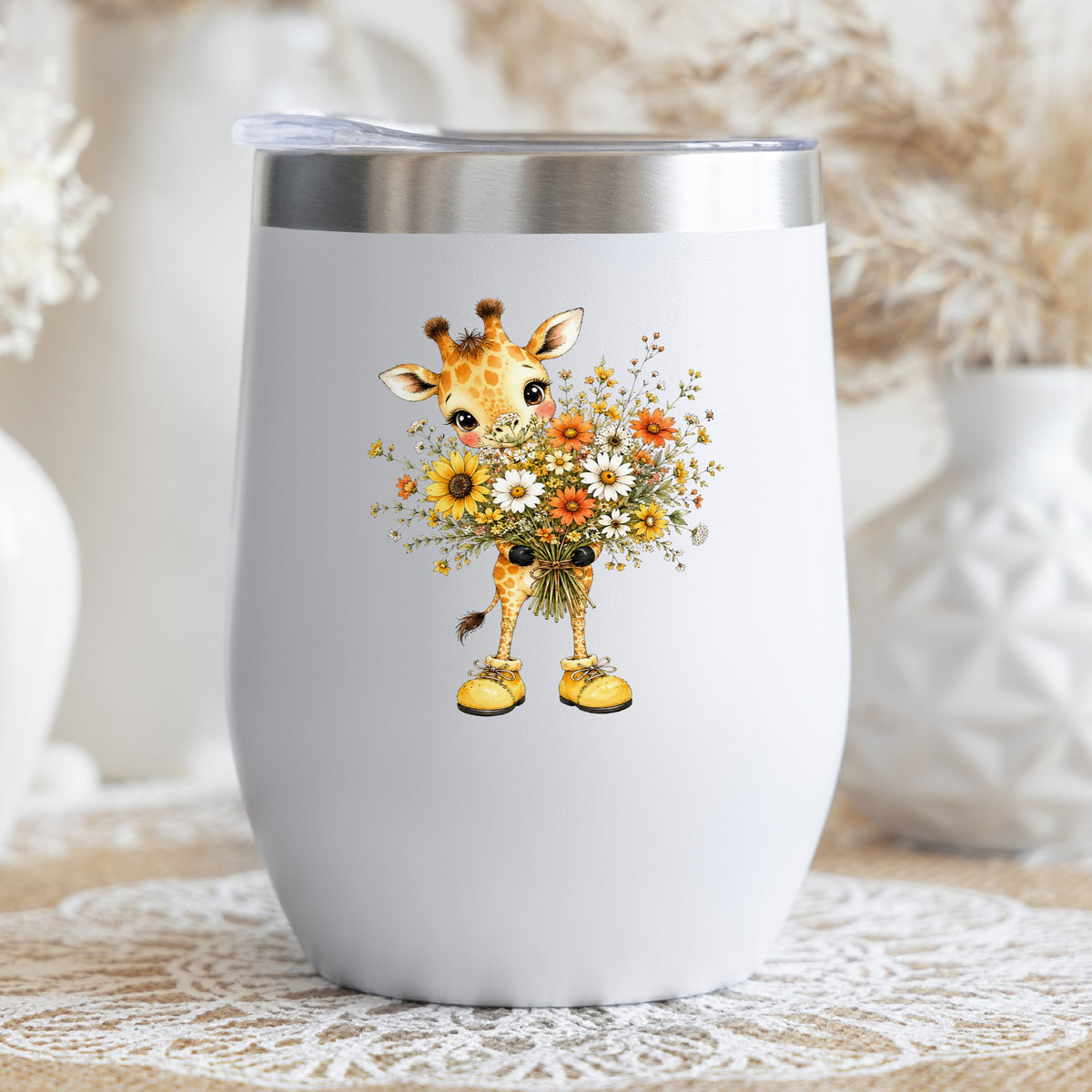 Giraffe Holding Sunflower Bouquet UV DTF sticker applied to a white stemless tumbler with a lid