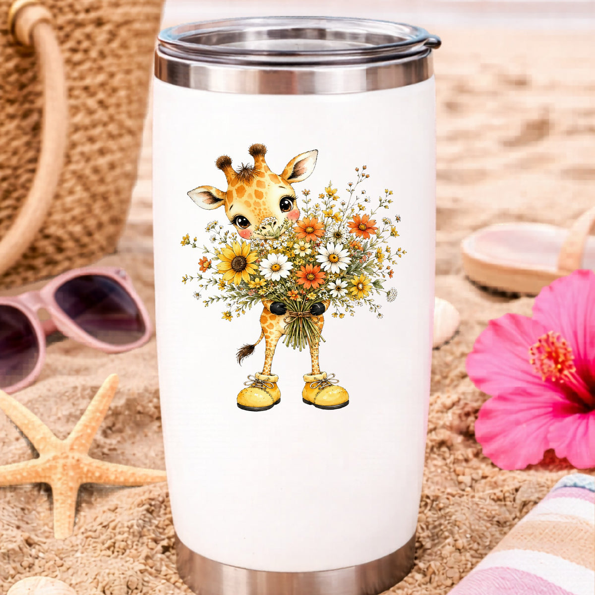 Giraffe Holding Sunflower Bouquet UV DTF sticker applied to a white travel tumbler on beach sand