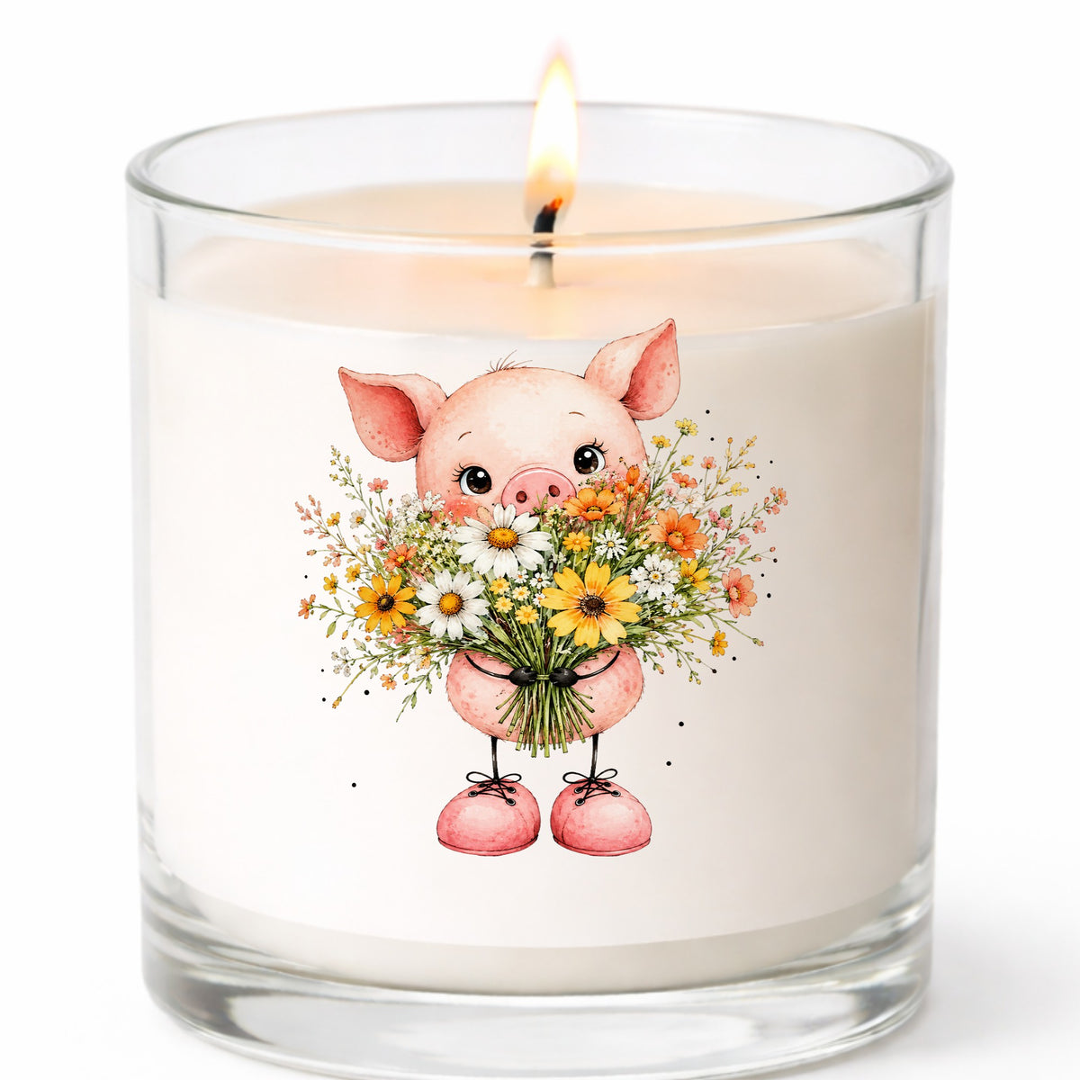 Pink Pig Holding Wildflower Bouquet UV DTF sticker applied to a white candle in a clear glass jar