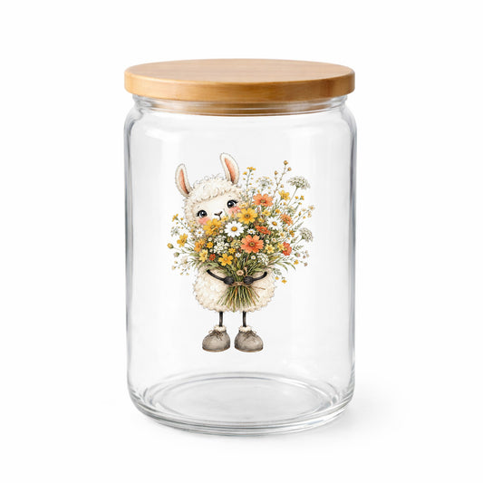 White Llama Holding Daisy Bouquet UV DTF sticker applied to a clear glass jar with a wooden lid