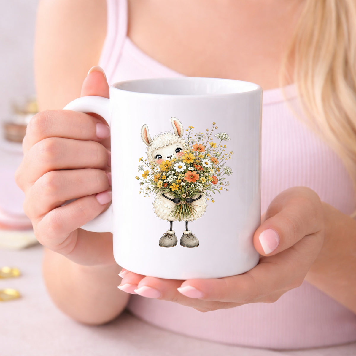 White Llama Holding Daisy Bouquet UV DTF sticker applied to a white coffee mug held in both hands