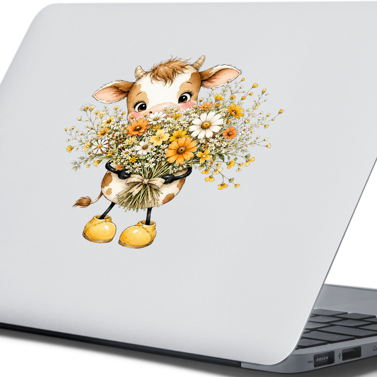Baby Cow Holding Wildflower Bouquet UV DTF sticker applied to the lid of a silver laptop