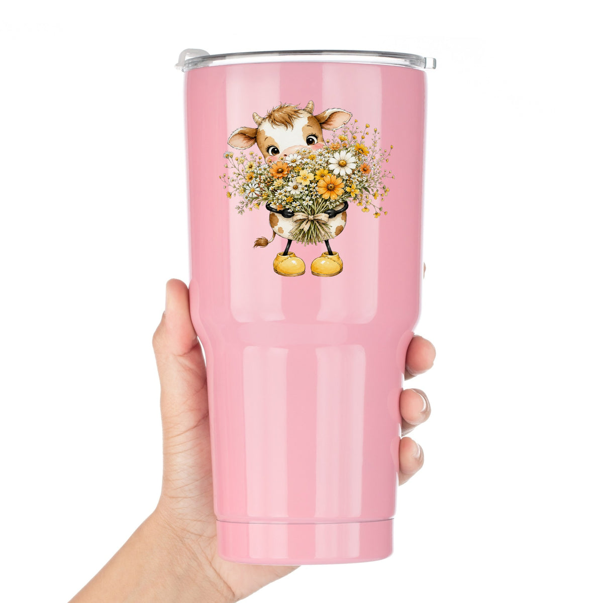 Baby Cow Holding Wildflower Bouquet UV DTF sticker applied to a pink tumbler held against a white background