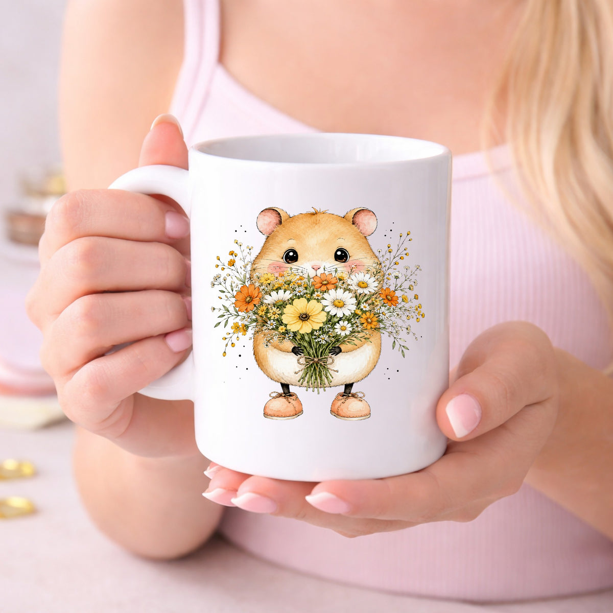 Hamster Holding Wildflower Bouquet UV DTF sticker applied to a white coffee mug held in both hands