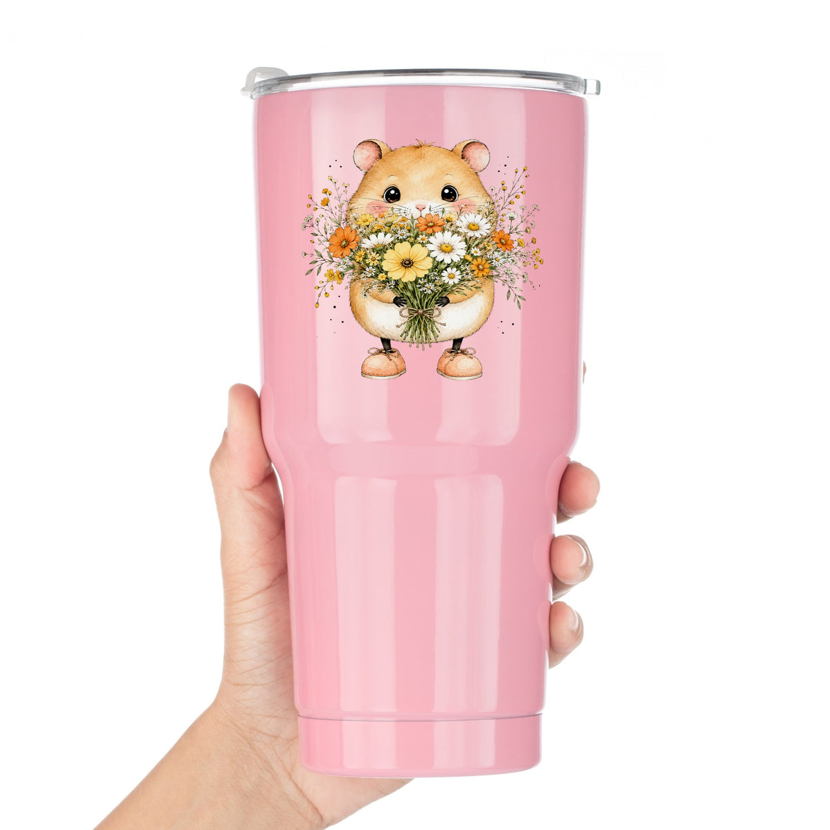 Hamster Holding Wildflower Bouquet UV DTF sticker applied to a pink tumbler held against a white background