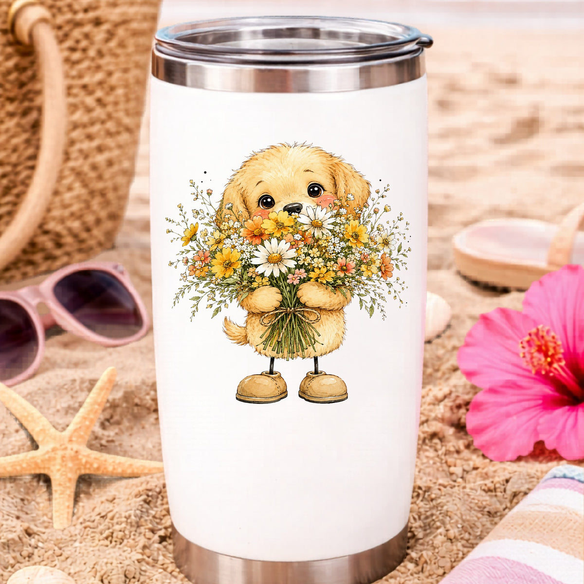 Golden Puppy Holding Daisy Bouquet UV DTF sticker applied to a white travel tumbler on beach sand
