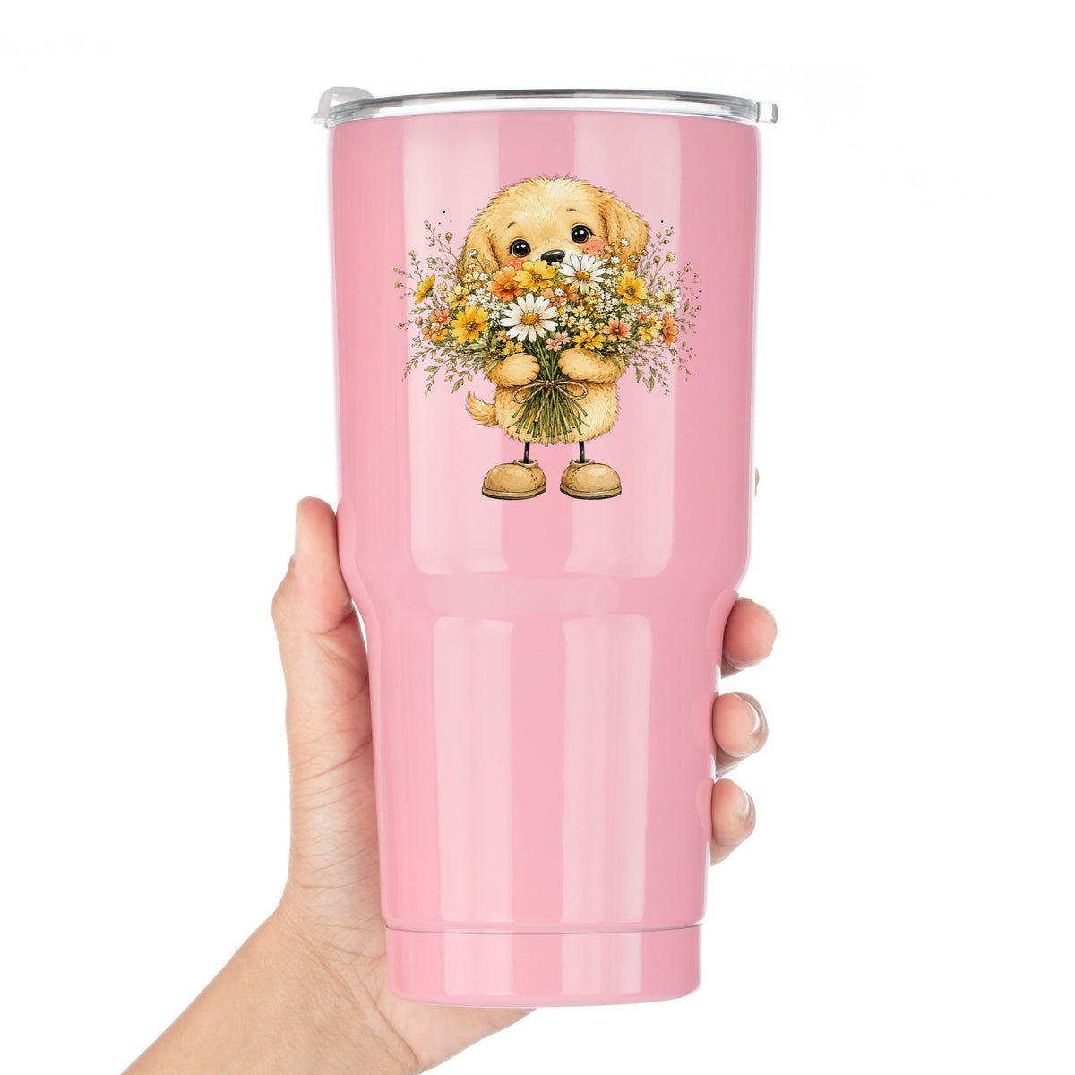 Golden Puppy Holding Daisy Bouquet UV DTF sticker applied to a pink tumbler held against a white background
