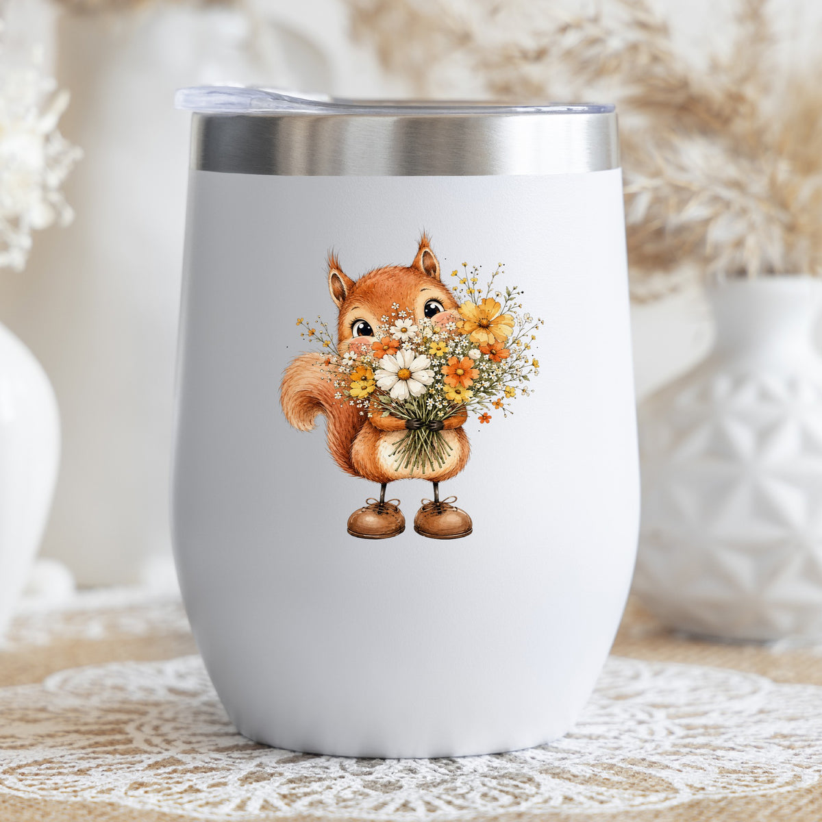 Red Squirrel Holding Daisy Bouquet UV DTF sticker applied to a white stemless tumbler with a lid