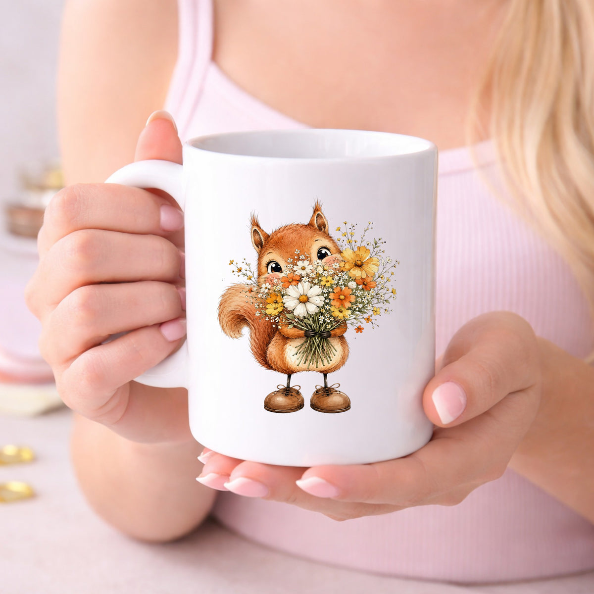 Red Squirrel Holding Daisy Bouquet UV DTF sticker applied to a white coffee mug held in both hands