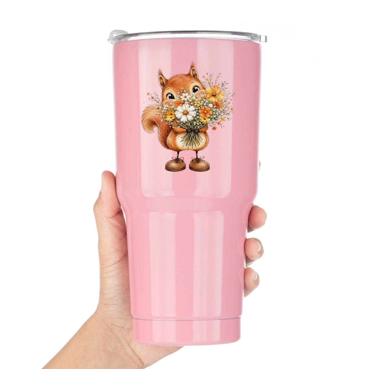 Red Squirrel Holding Daisy Bouquet UV DTF sticker applied to a pink tumbler held against a white background