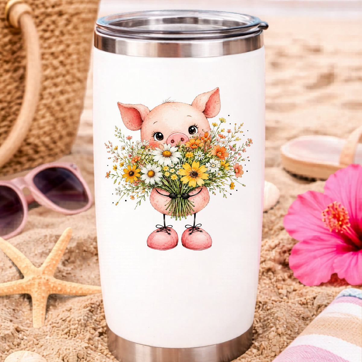 Baby Pig Holding Daisy Bouquet UV DTF sticker applied to a white travel tumbler on beach sand