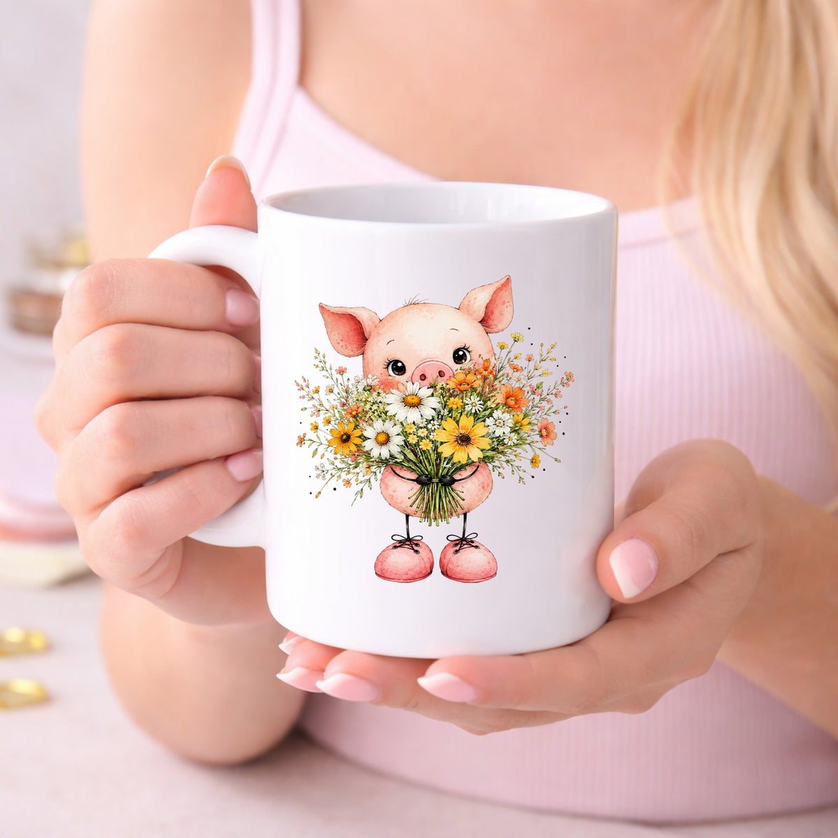 Baby Pig Holding Daisy Bouquet UV DTF sticker applied to a white coffee mug held in both hands