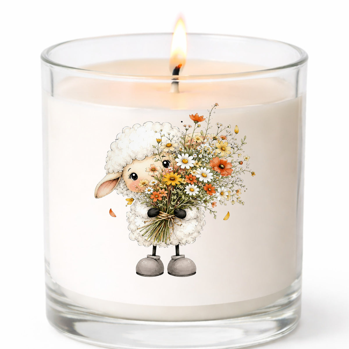 White Lamb Holding Wildflower Bouquet UV DTF sticker applied to a white candle in a clear glass jar