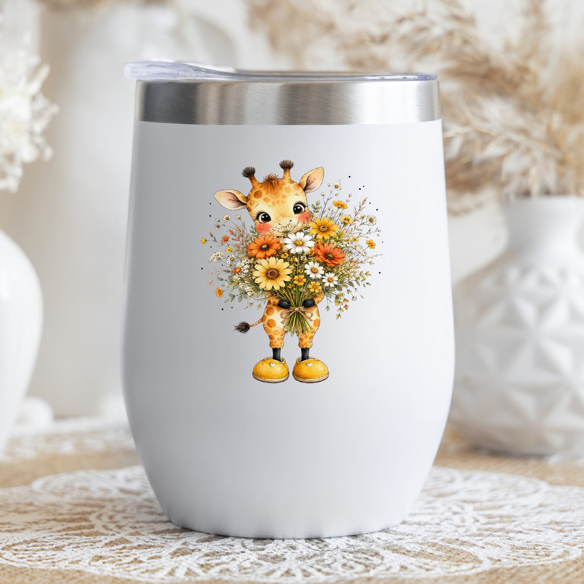 Watercolor Giraffe Holding Daisy Bouquet UV DTF sticker applied to a white stemless tumbler with a lid