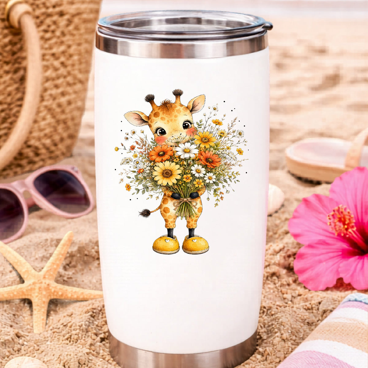 Watercolor Giraffe Holding Daisy Bouquet UV DTF sticker applied to a white travel tumbler on beach sand