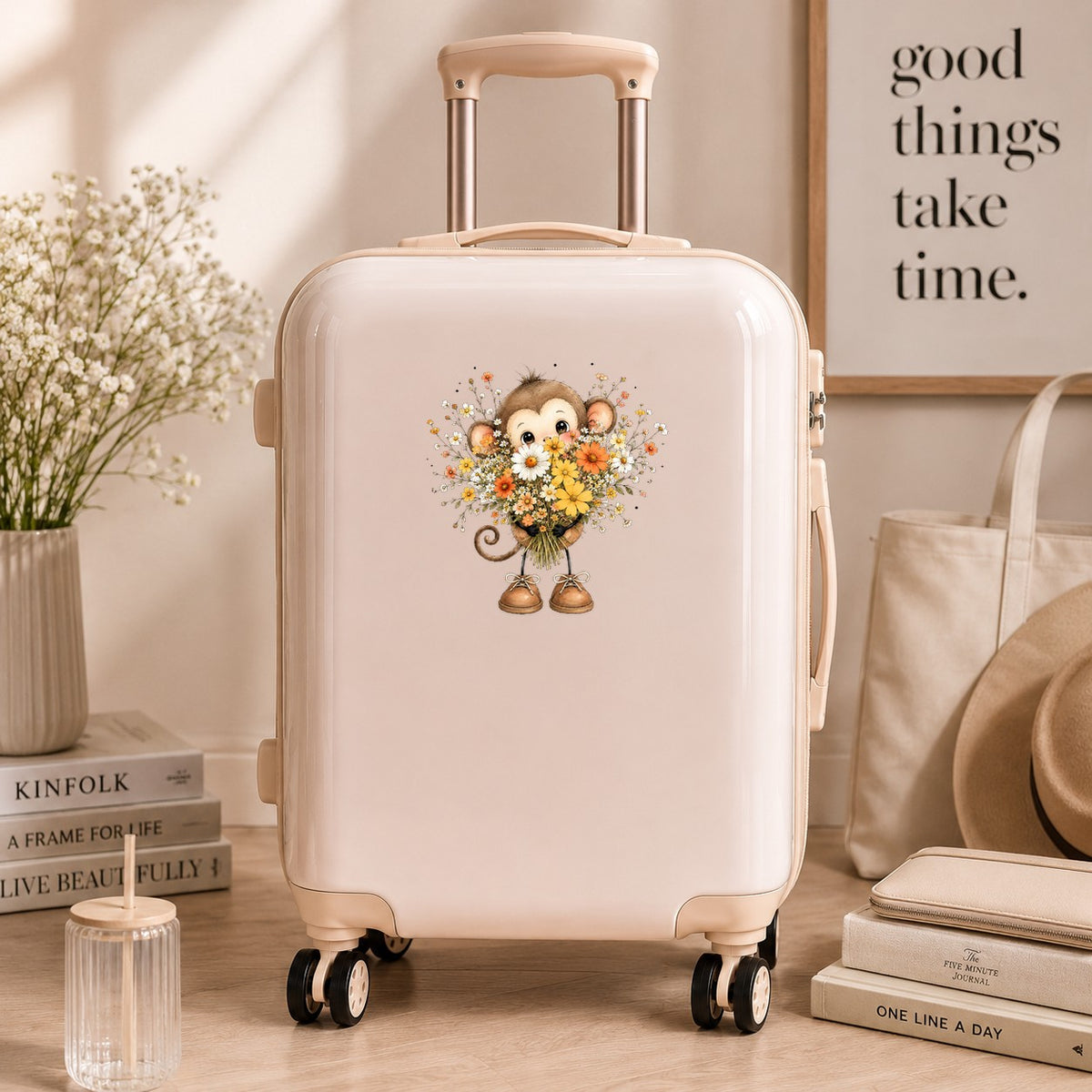 Baby Monkey Holding Daisy Bouquet UV DTF sticker applied to a cream carry-on suitcase