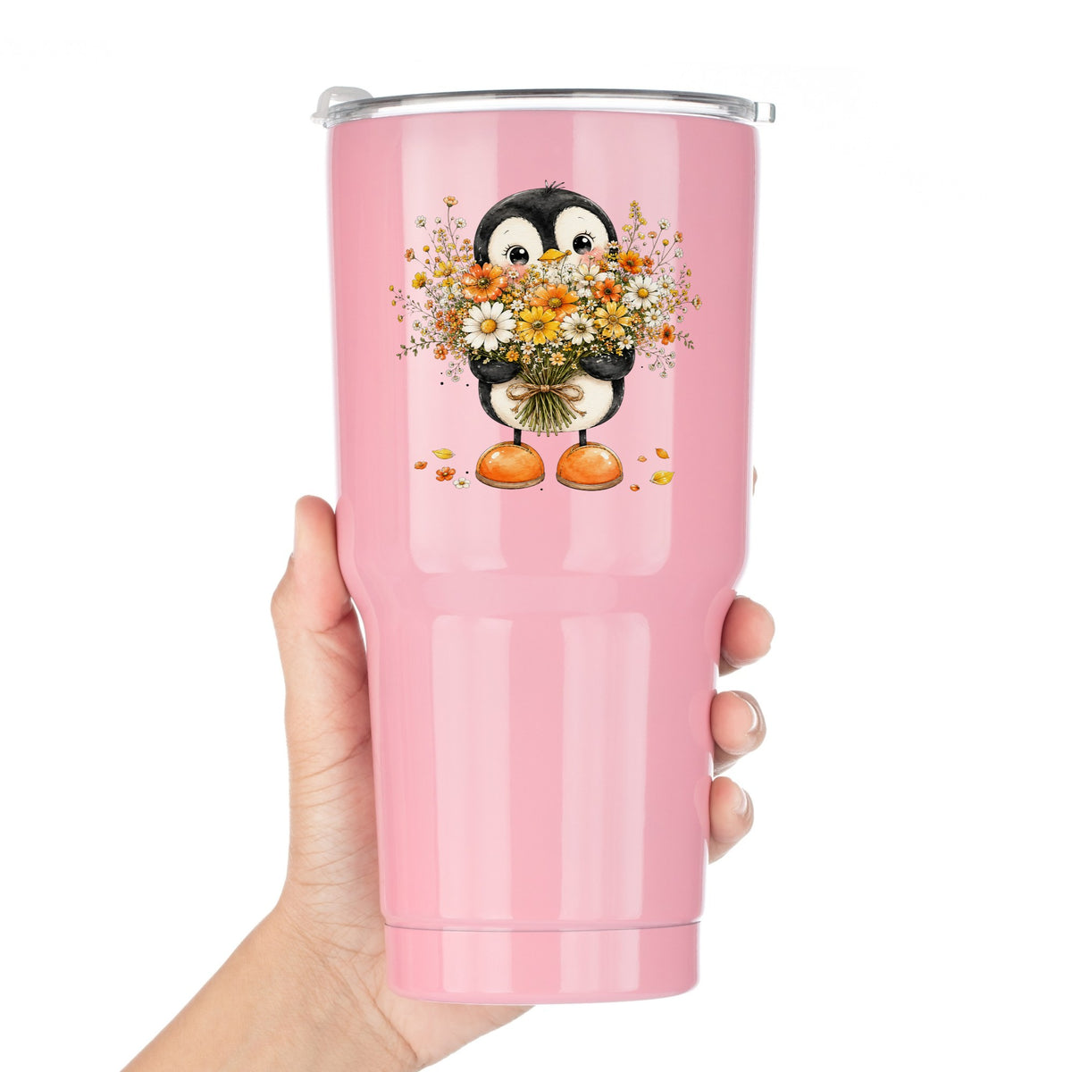 Baby Penguin Holding Wildflower Bouquet UV DTF sticker applied to a pink tumbler held against a white background