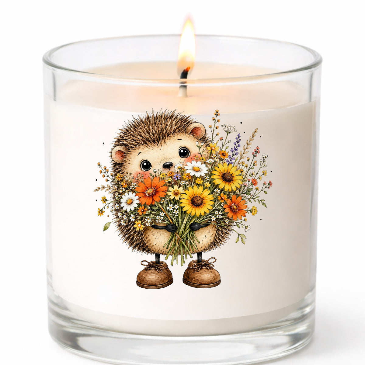 Hedgehog Holding Wildflower Bouquet UV DTF sticker applied to a white candle in a clear glass jar