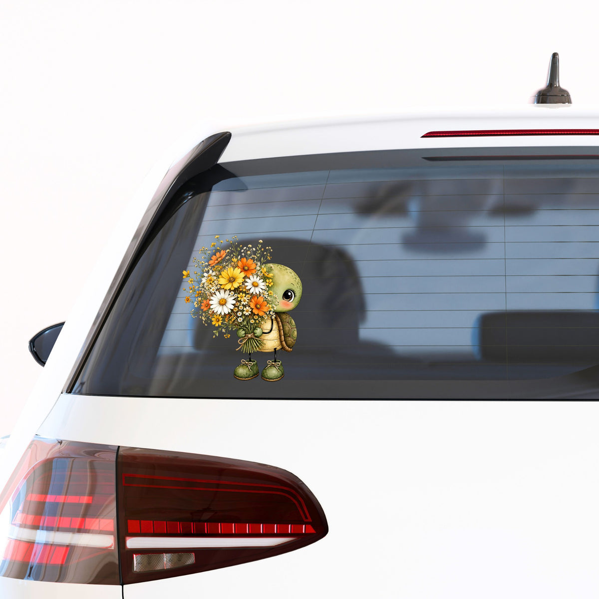 Baby Turtle Holding Wildflower Bouquet UV DTF sticker applied to the rear window of a white car