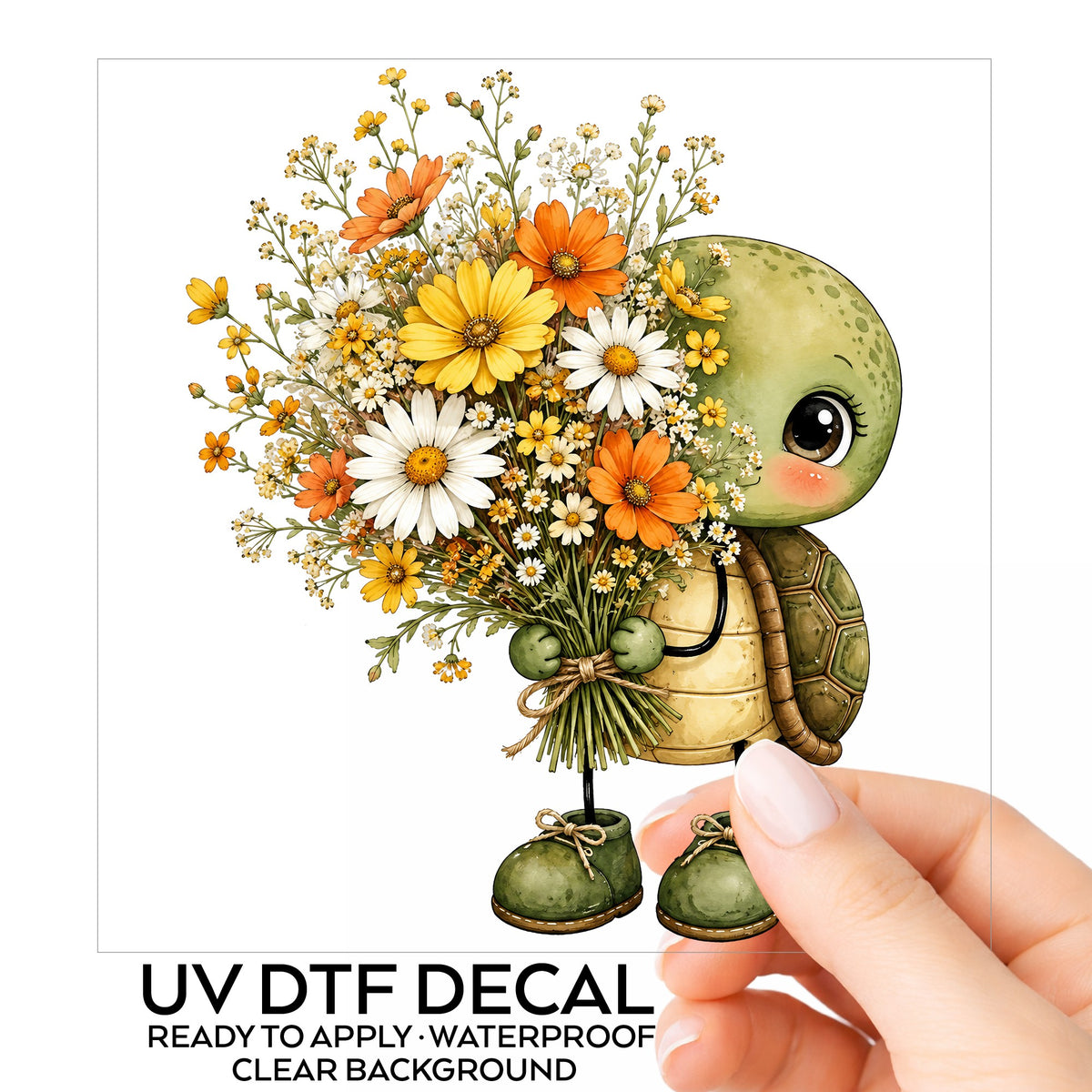Baby Turtle Holding Wildflower Bouquet UV DTF sticker on its backing card, held in hand