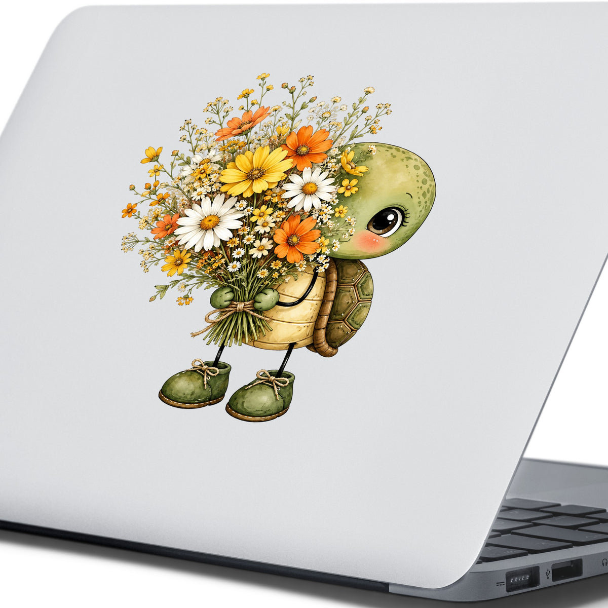 Baby Turtle Holding Wildflower Bouquet UV DTF sticker applied to the lid of a silver laptop