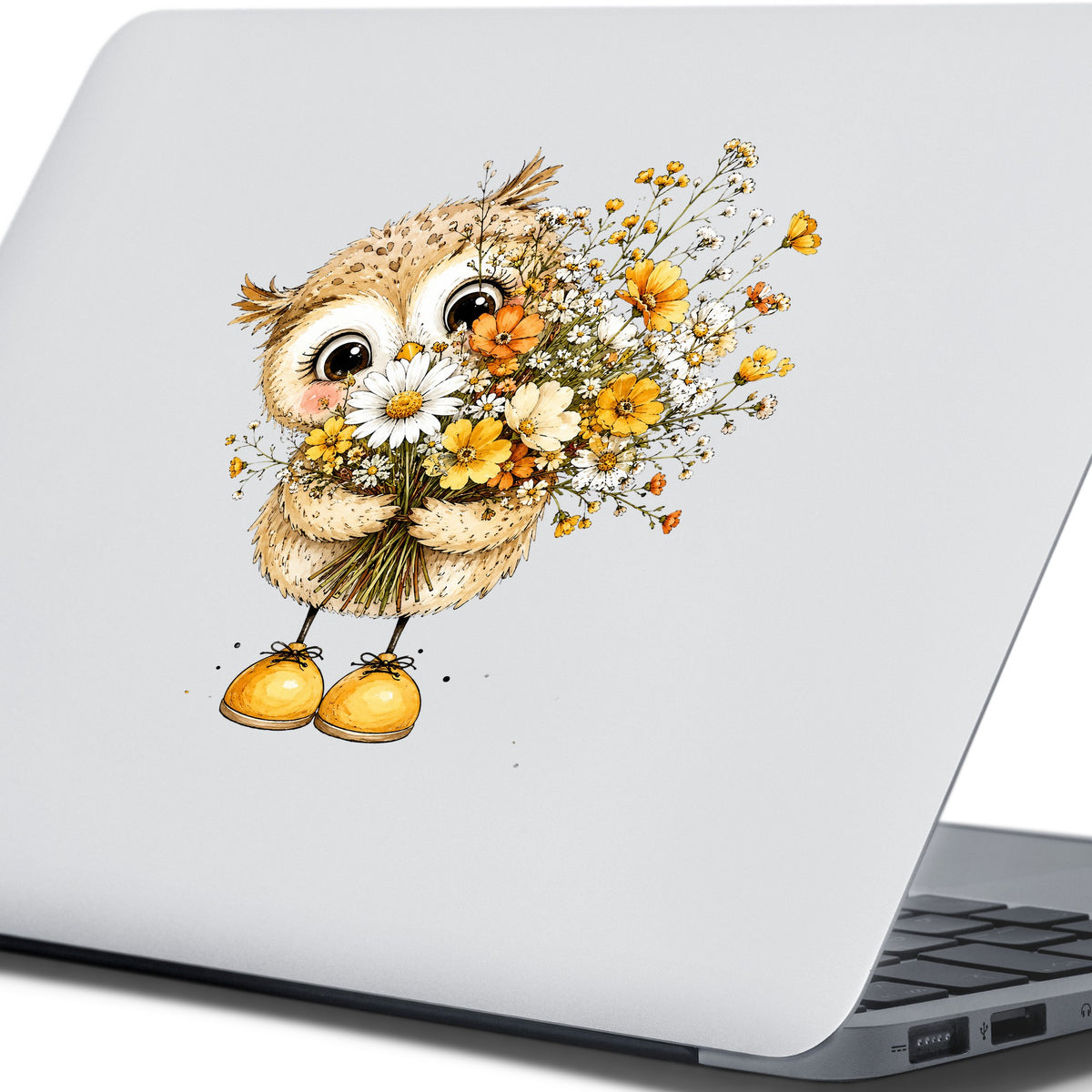 Baby Owl Holding Wildflower Bouquet UV DTF sticker applied to the lid of a silver laptop