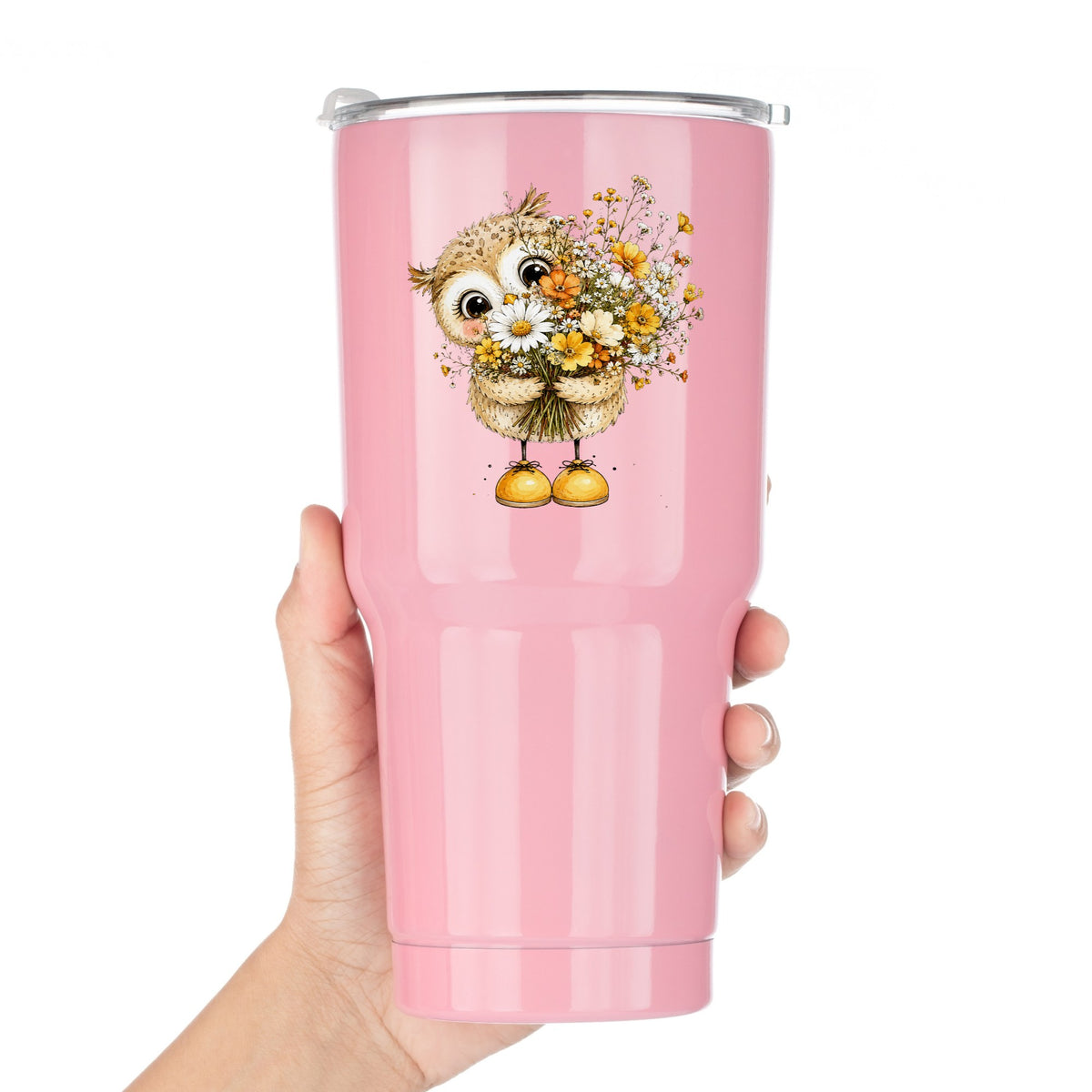 Baby Owl Holding Wildflower Bouquet UV DTF sticker applied to a pink tumbler held against a white background