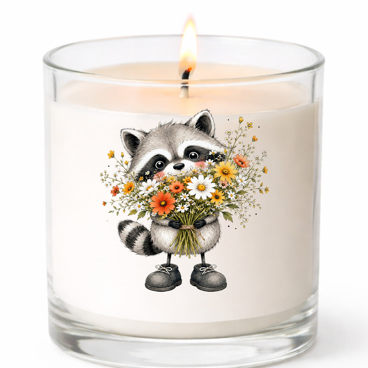 Raccoon Holding Wildflower Bouquet UV DTF sticker applied to a white candle in a clear glass jar