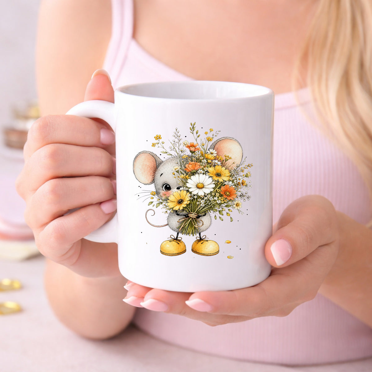 Little Mouse Holding Daisy Bouquet UV DTF sticker applied to a white coffee mug held in both hands