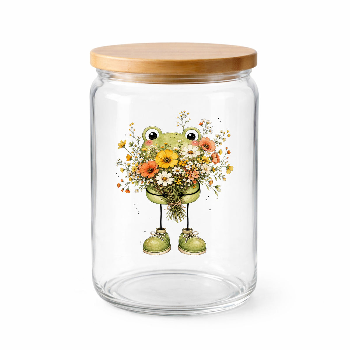 Green Frog Holding Wildflower Bouquet UV DTF sticker applied to a clear glass jar with a wooden lid