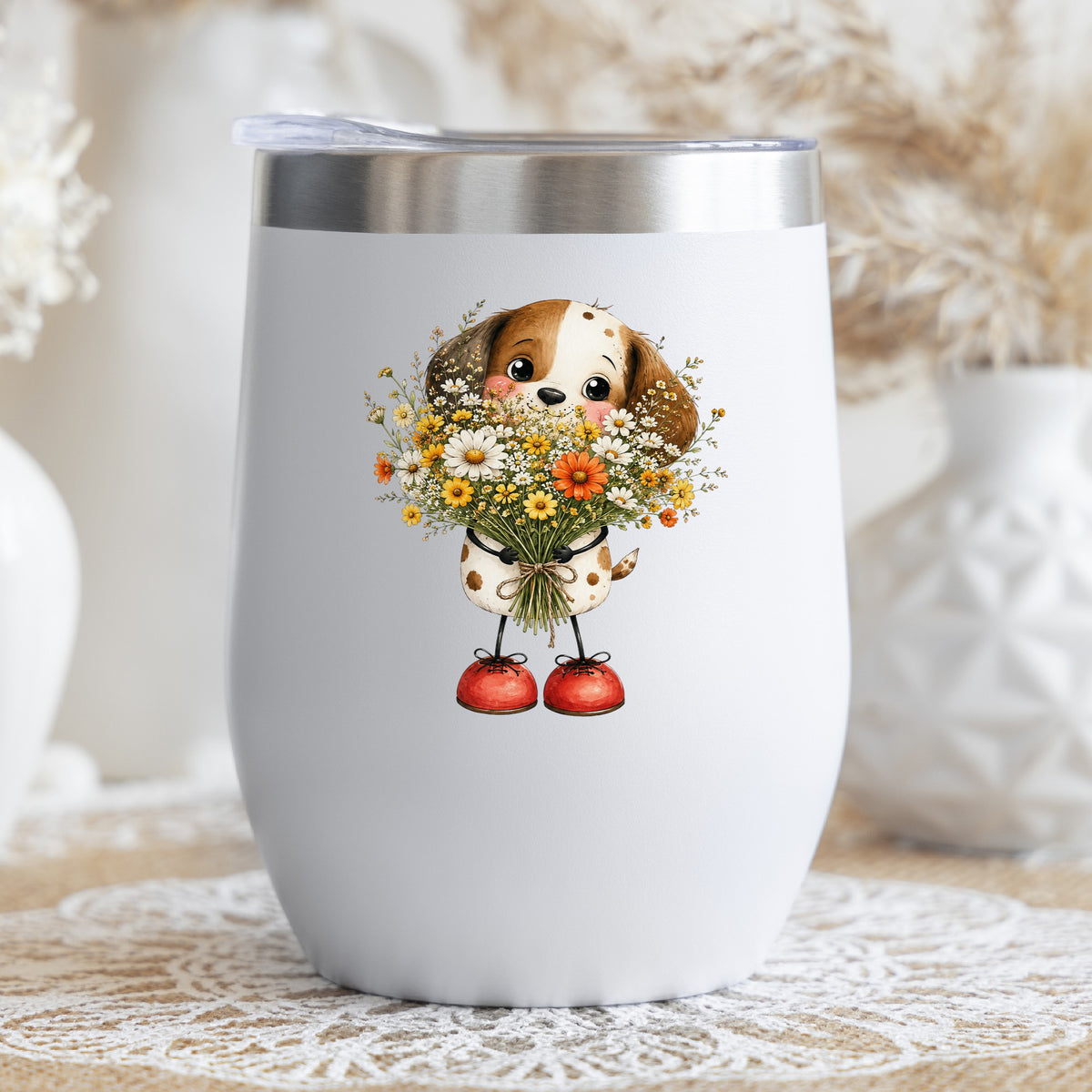 Brown Puppy Holding Daisy Bouquet UV DTF sticker applied to a white stemless tumbler with a lid