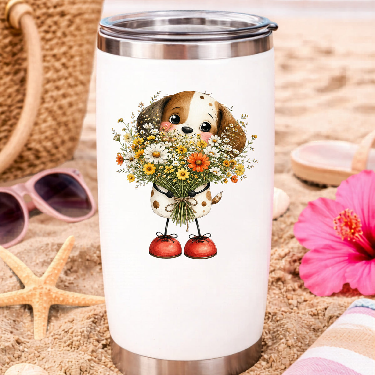 Brown Puppy Holding Daisy Bouquet UV DTF sticker applied to a white travel tumbler on beach sand
