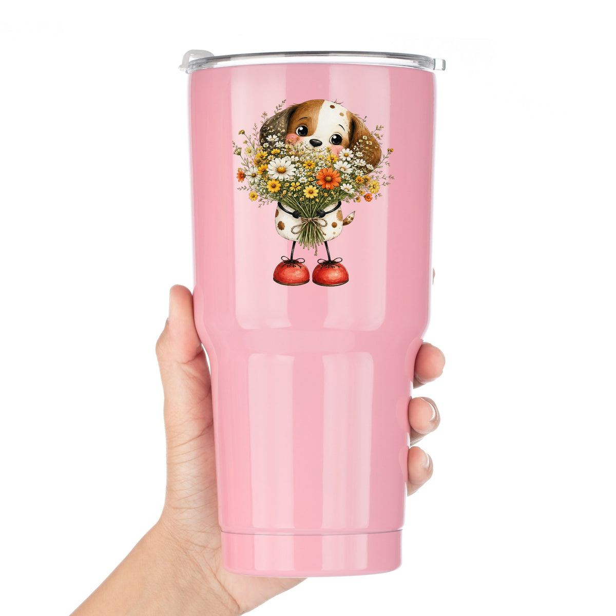 Brown Puppy Holding Daisy Bouquet UV DTF sticker applied to a pink tumbler held against a white background
