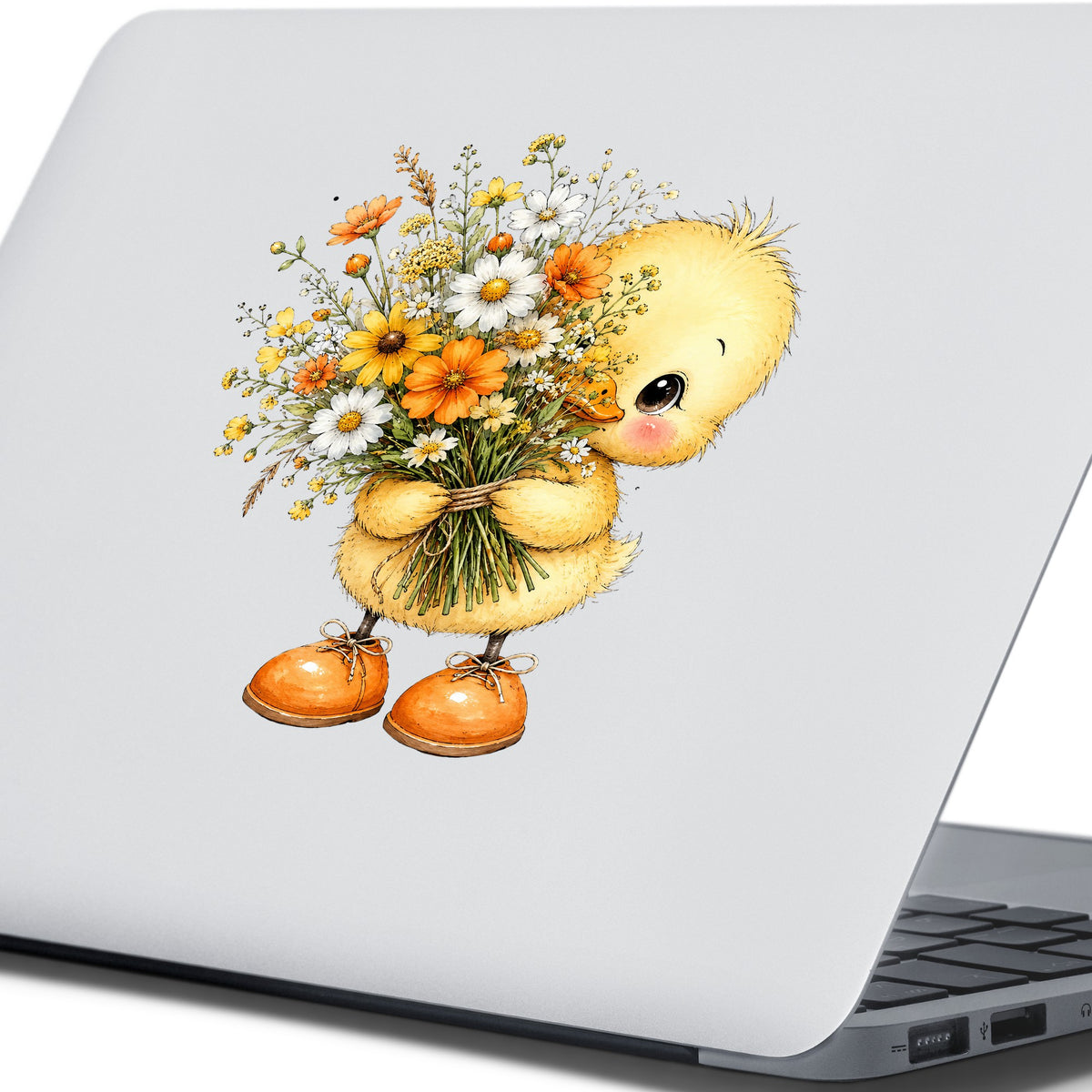 Yellow Duckling Holding Daisy Bouquet UV DTF sticker applied to the lid of a silver laptop