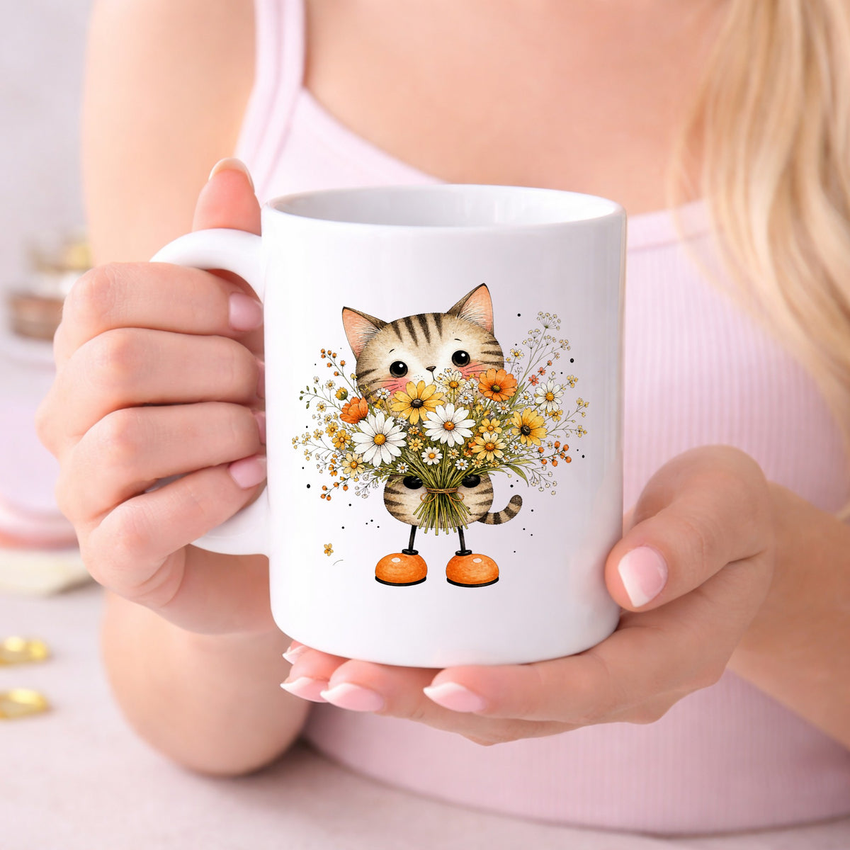 Tabby Cat Holding Daisy Bouquet UV DTF sticker applied to a white coffee mug held in both hands
