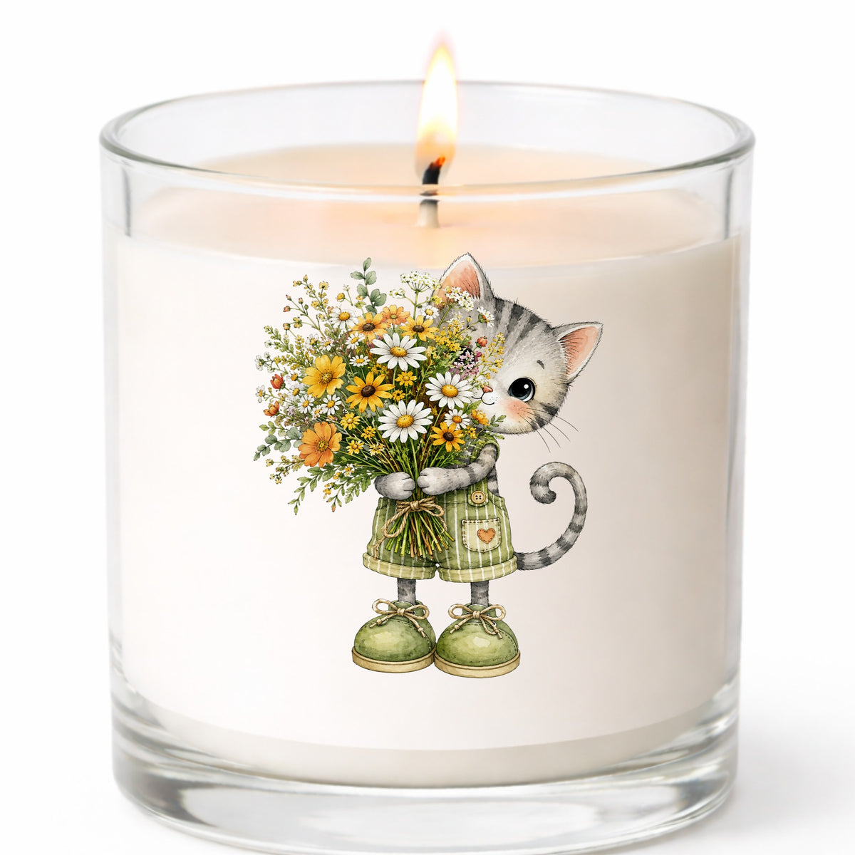 Grey Kitten In Overalls Holding Flowers UV DTF sticker applied to a white candle in a clear glass jar