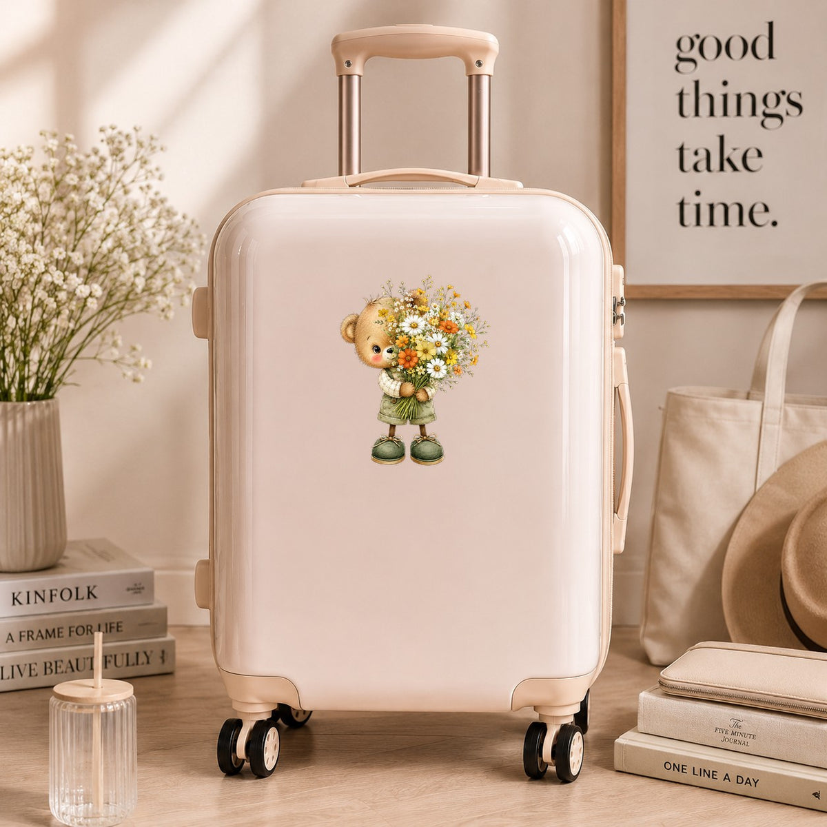 Brown Bear In Overalls Holding Daisy Bouquet UV DTF sticker applied to a cream carry-on suitcase