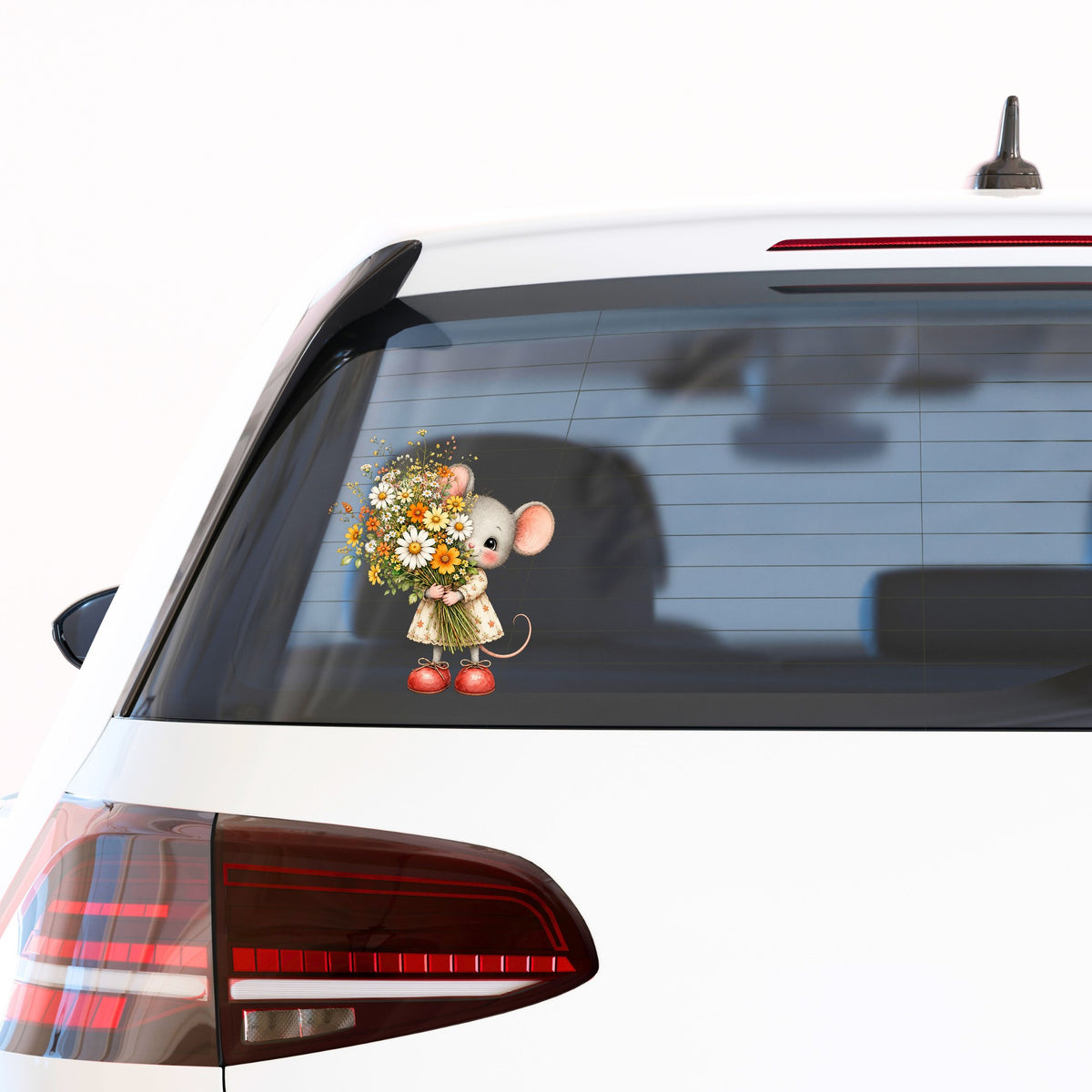 Mouse In Floral Dress Holding Flowers UV DTF sticker applied to the rear window of a white car