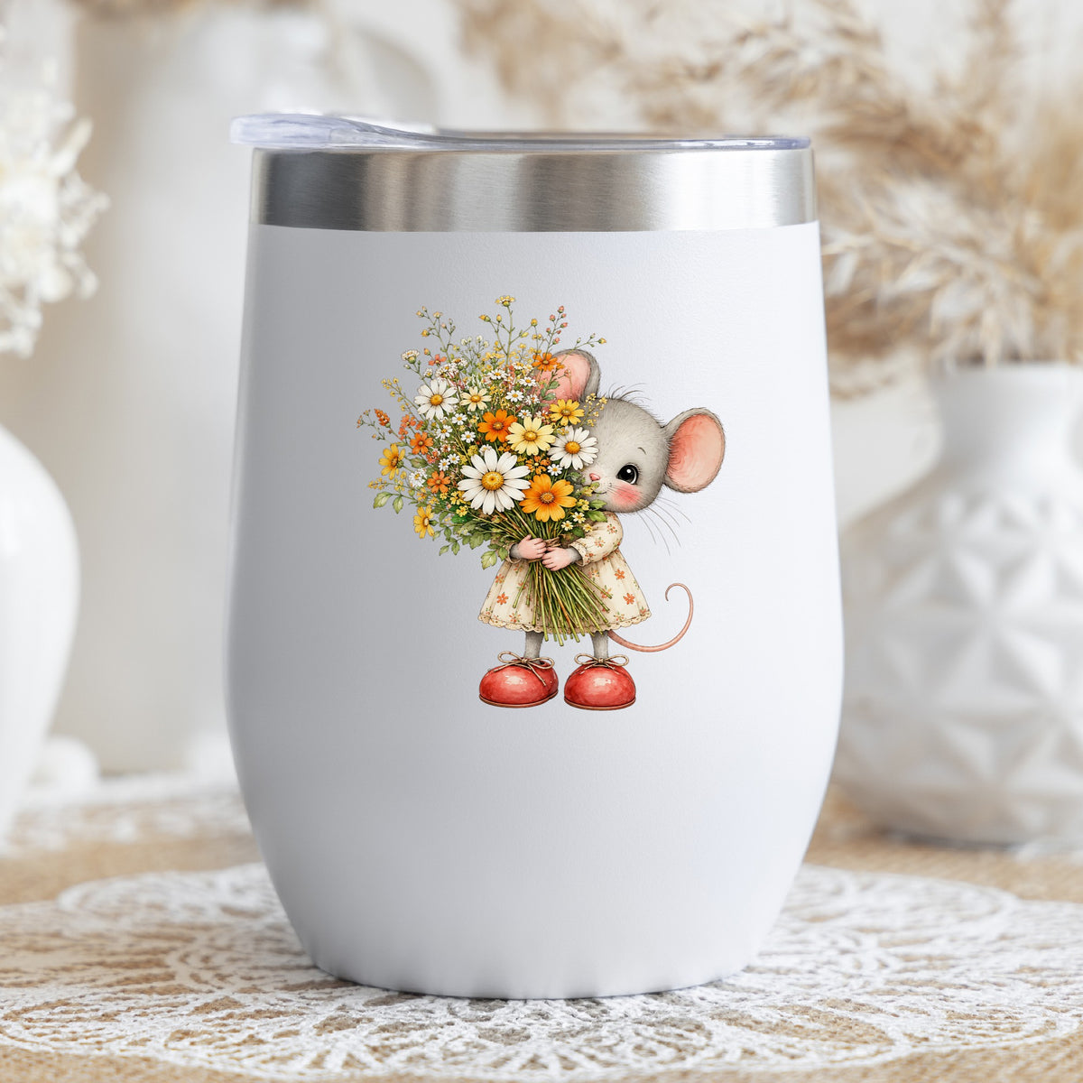 Mouse In Floral Dress Holding Flowers UV DTF sticker applied to a white stemless tumbler with a lid