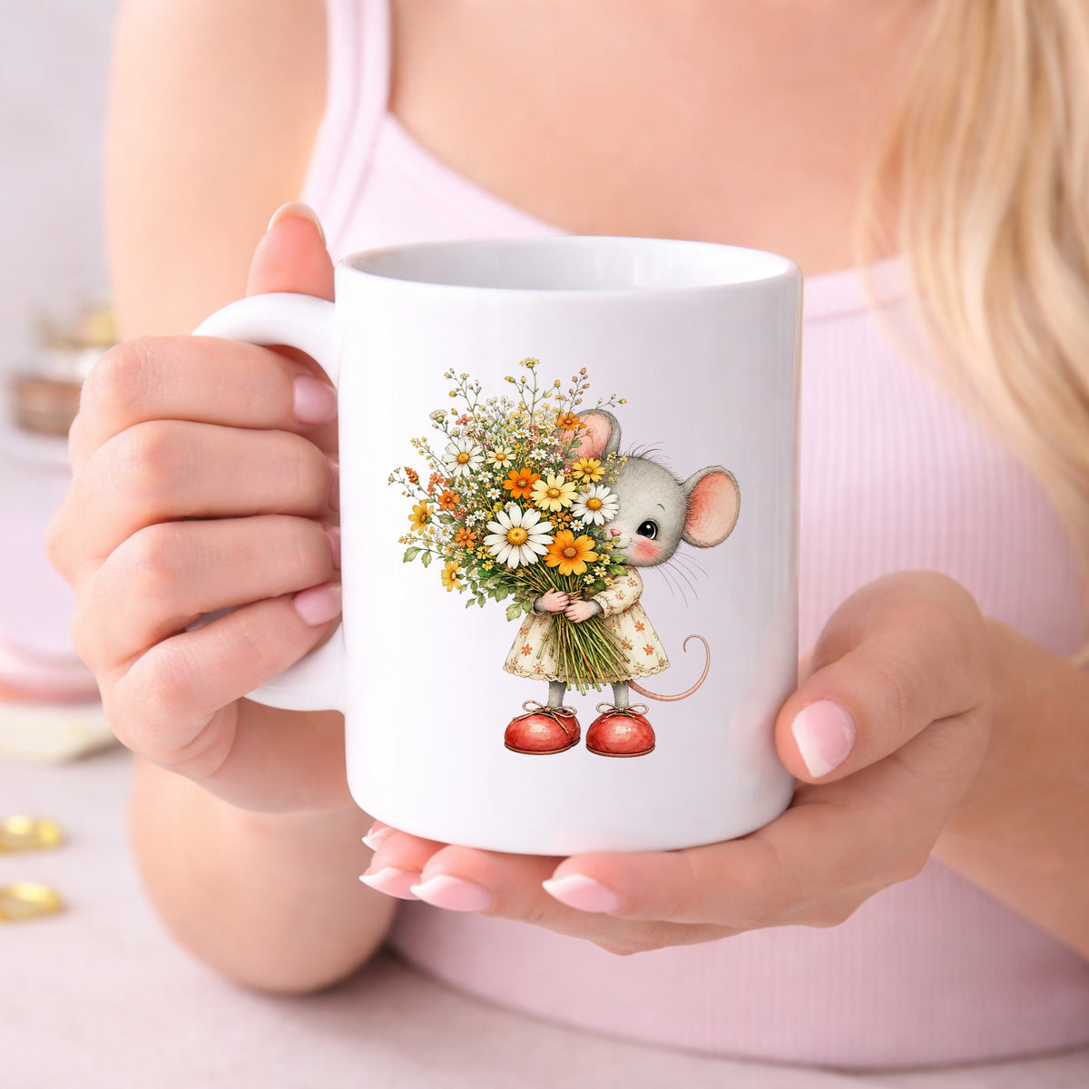 Mouse In Floral Dress Holding Flowers UV DTF sticker applied to a white coffee mug held in both hands