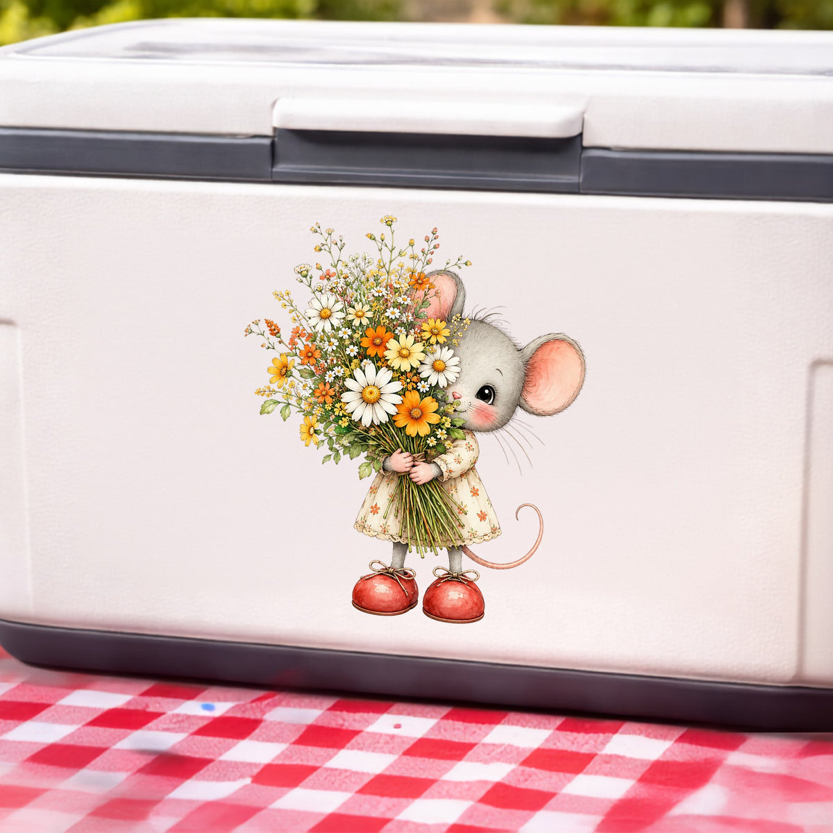 Mouse In Floral Dress Holding Flowers UV DTF sticker applied to a white cooler on a red gingham cloth
