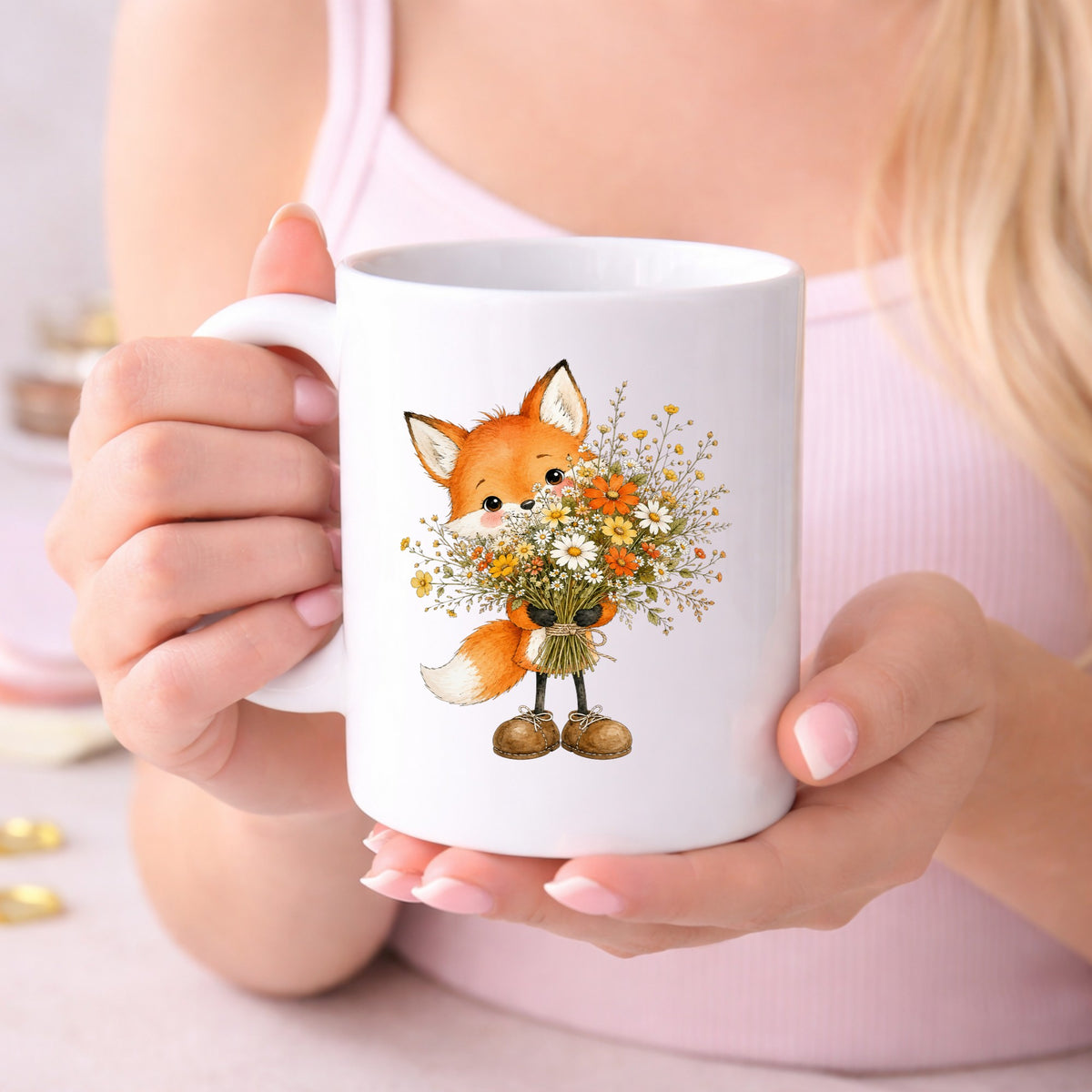 Orange Fox Holding Flower Bouquet UV DTF sticker applied to a white coffee mug held in both hands