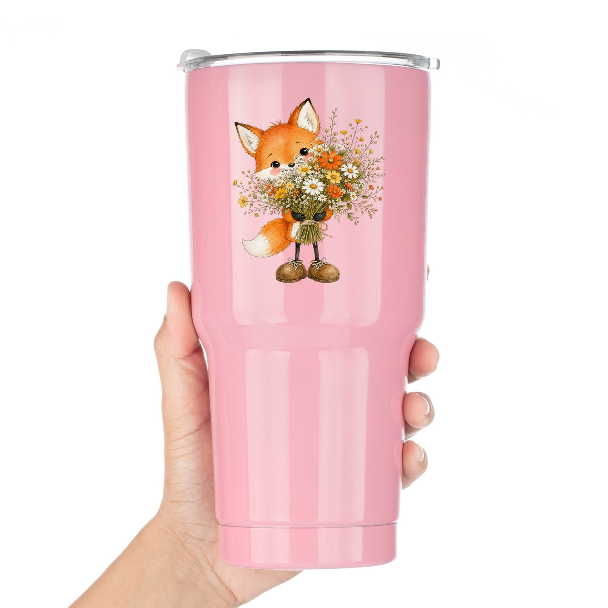 Orange Fox Holding Flower Bouquet UV DTF sticker applied to a pink tumbler held against a white background