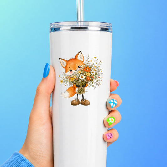 Orange Fox Holding Flower Bouquet UV DTF sticker applied to a white straw tumbler on a blue background