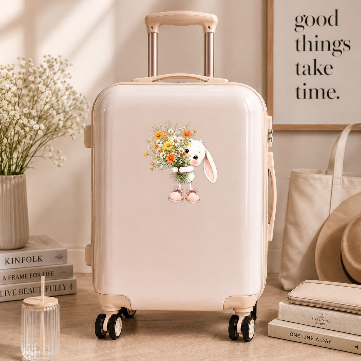 Baby Bunny Holding Daisy Bouquet UV DTF sticker applied to a cream carry-on suitcase