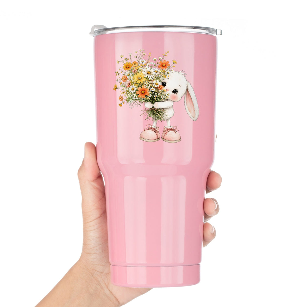 Baby Bunny Holding Daisy Bouquet UV DTF sticker applied to a pink tumbler held against a white background
