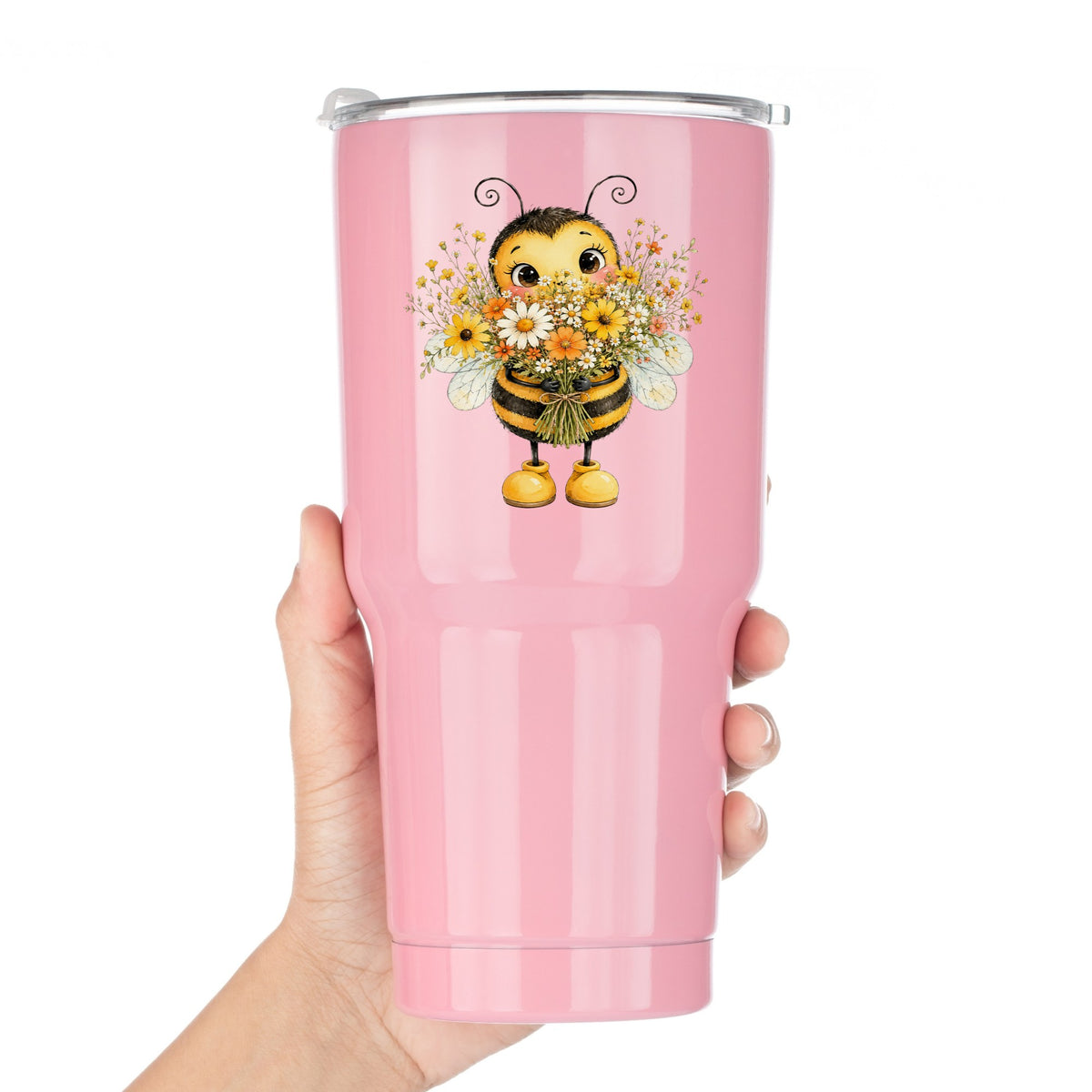 Bumble Bee Holding Daisy Bouquet UV DTF sticker applied to a pink tumbler held against a white background