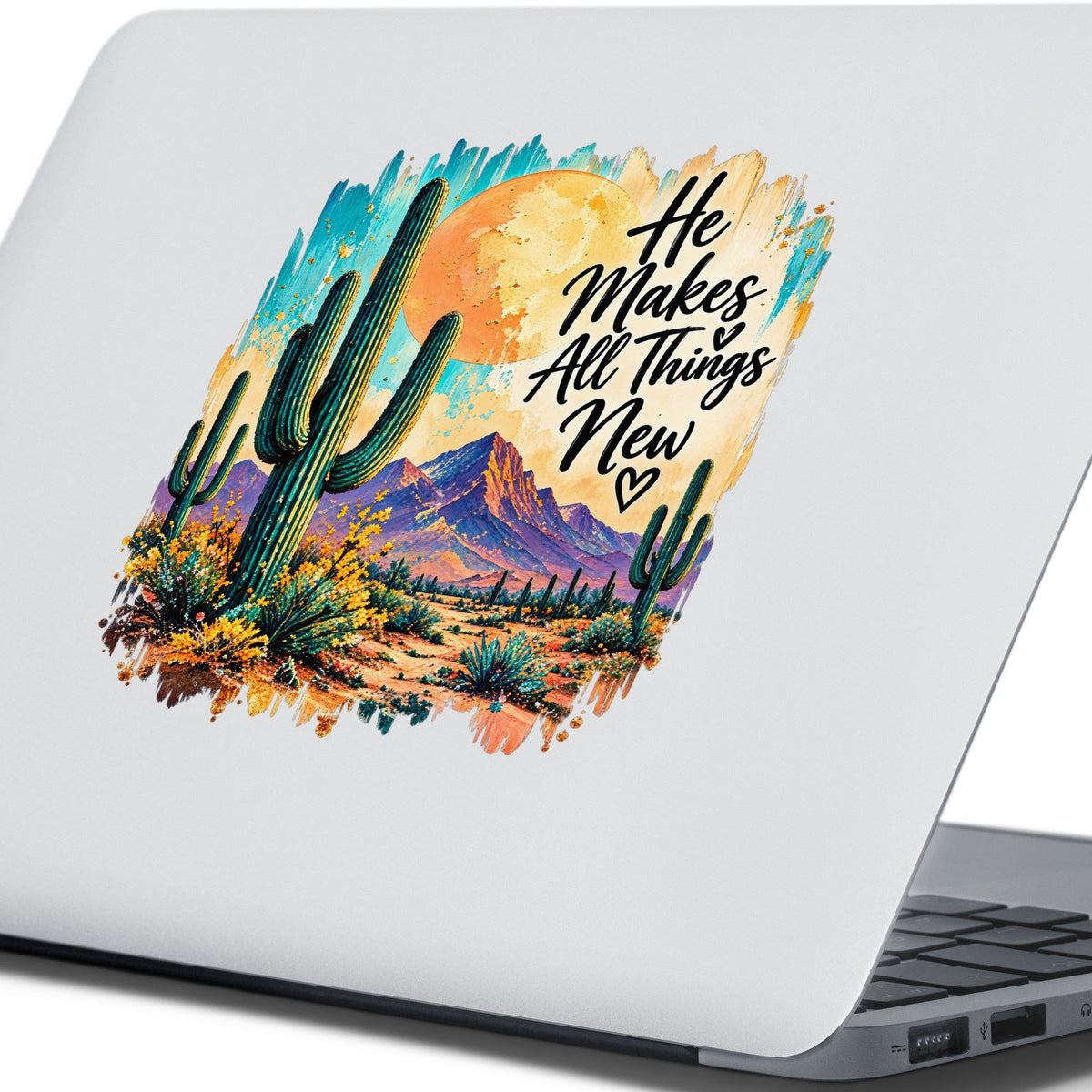 He Makes All Things New desert cactus UV DTF sticker on a blank laptop