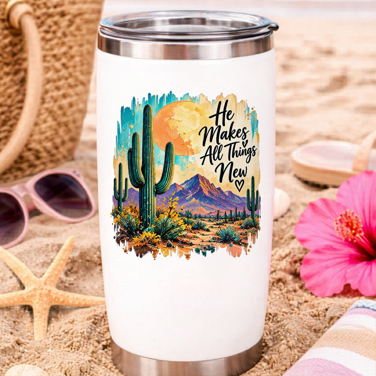 He Makes All Things New desert cactus UV DTF sticker on a beach water cup