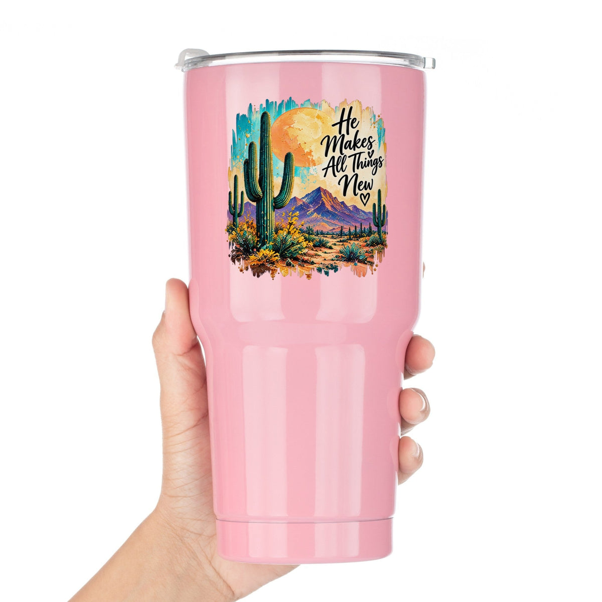 He Makes All Things New desert cactus UV DTF sticker on a pink tumbler